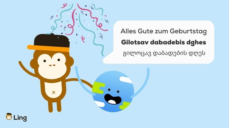 Maskottchen Ling und Gaia feiern Geburstag mit Sprechblase in der Alles Gute zum Geburtstag auf Deutsch und georgische Schrift und eine Transliteration