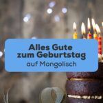Geburtstagskuchen mit Kerzen um Alles Gute zum Geburtstag auf Mongolisch zu wünschen