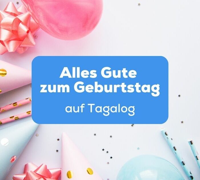 Geburtstaghütchen, Luftballon und Konfetti liegen auf dem Tisch