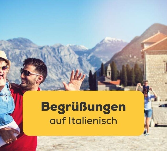 Ein Vater und seine Tocher begrüßen jemanden auf Italienisch