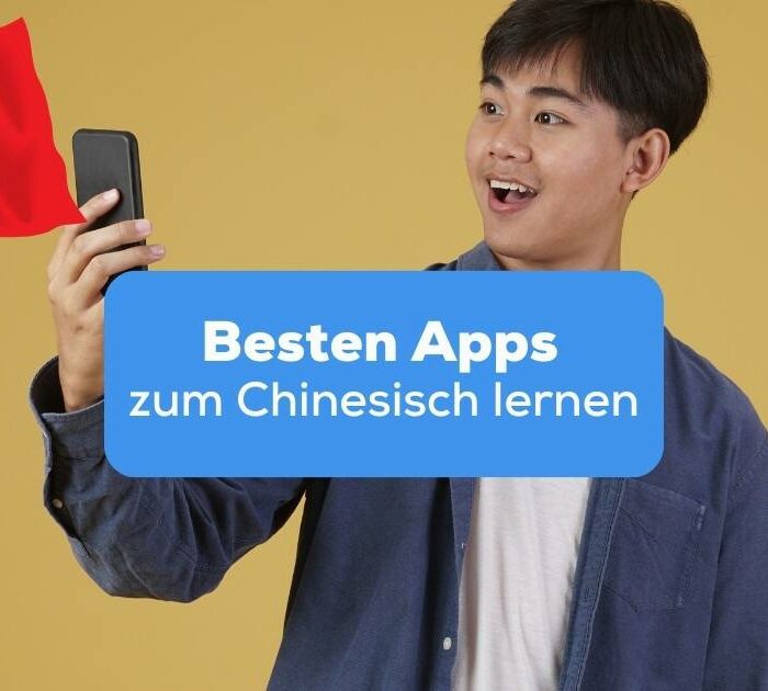Junger Mann hält sein Handy hoch und ist erstaunt über die besten Apps zum Chinesisch lernen mit der Ling-App