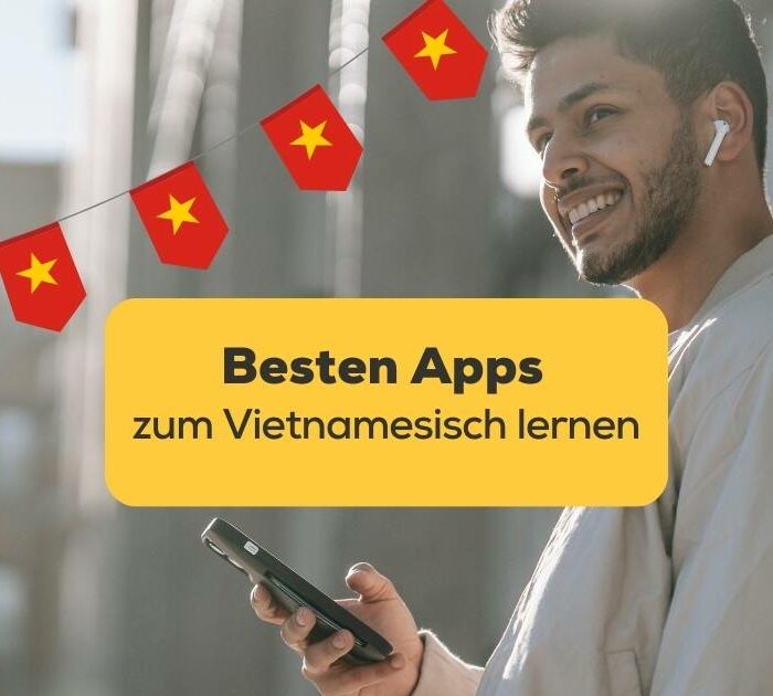Mann hat Handy in der Hand und sucht besten Apps zum Vietnamesisch lernen mit der Ling-App