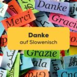 Papierschnipsel mit Danke in unterschiedlichen Sprachen unter anderem auch Danke auf Slowenisch