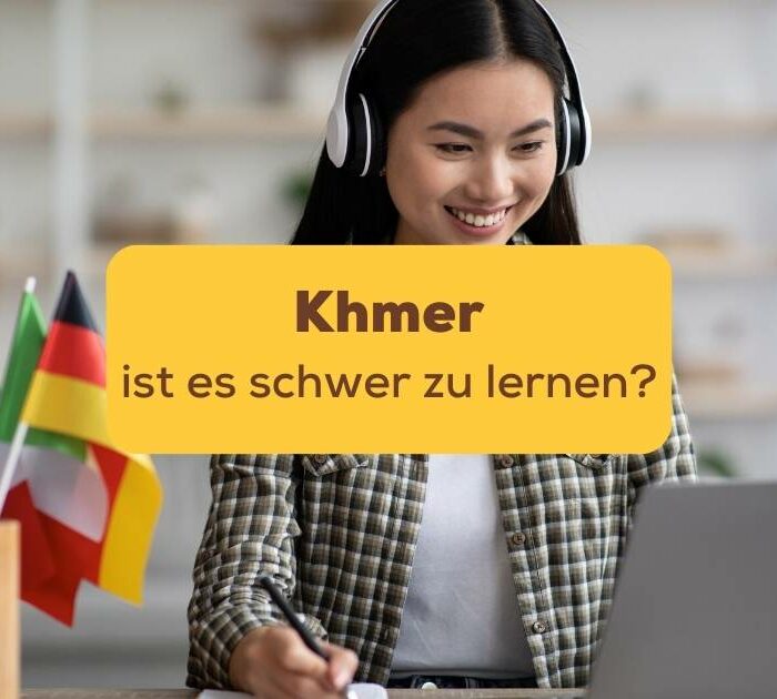 Frau lernt am Laptop und fragt sich: Ist Khmer lernen schwer?