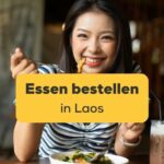 Asiatische Frau tut Essen bestellen in Laos
