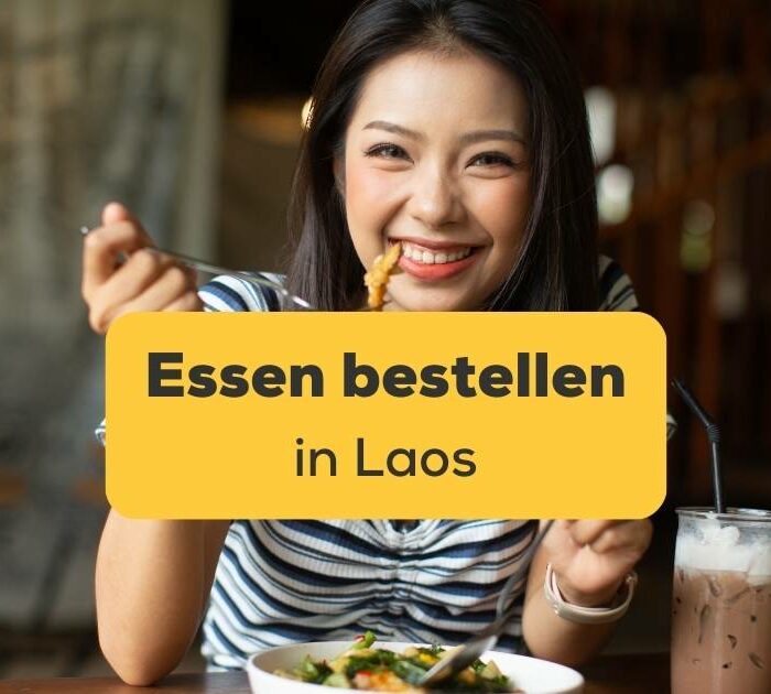 Asiatische Frau tut Essen bestellen in Laos