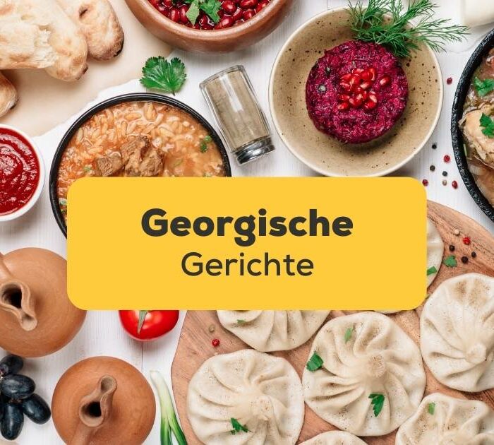 Tisch mit einer bunten Vielfalt georgische Gerichte, die man unbedingt probieren sollte