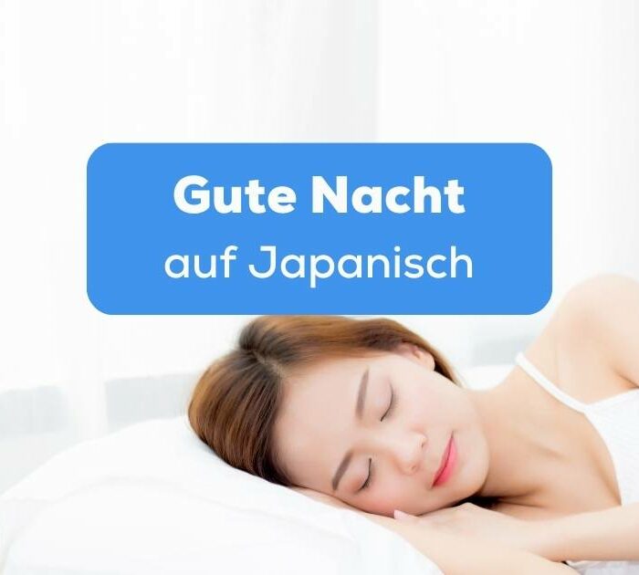 Japanische Frau liegt im Bett und schläft friedlich, nachdem sie Gute Nacht auf Japanisch gesagt hat