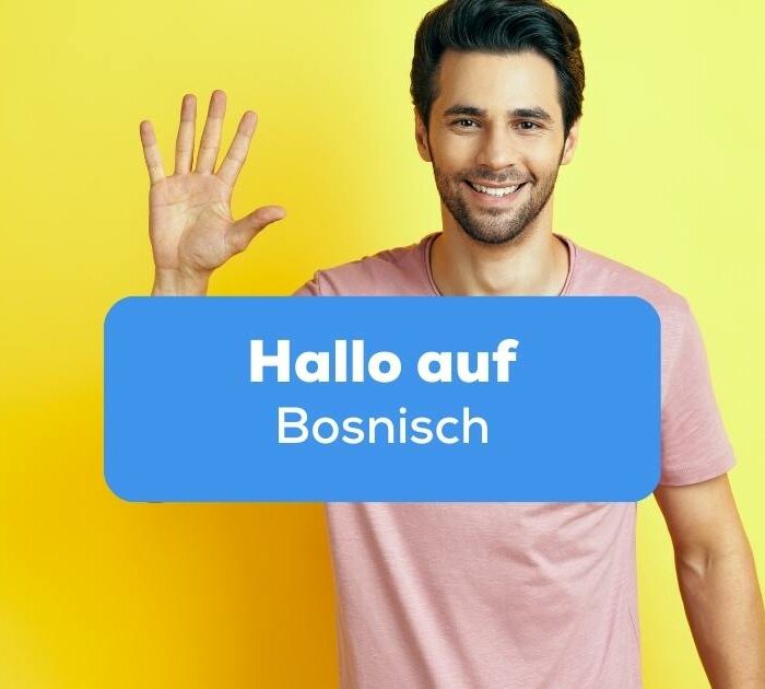 Mann winkt mit der rechten Hand in die Kamera um Hallo auf Bosnisch zu sagen