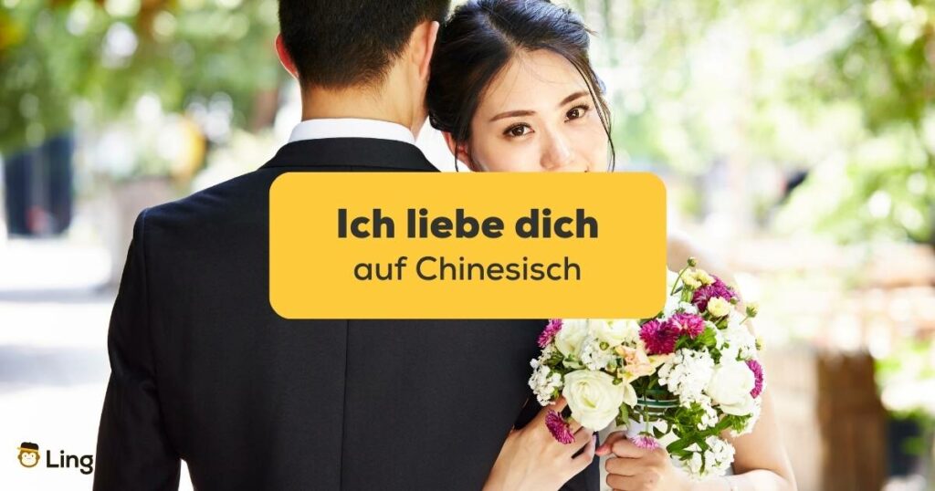 Chinesisches Brautpaat, das Ich liebe dich auf Chinesisch ausdrückt