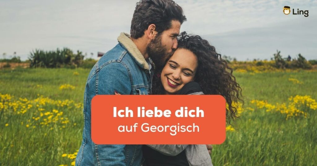 Mann küsst Frau auf die Stirn und sagt Ich liebe dich auf Georgisch