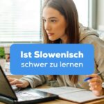 Frau lernt am Schreibtisch mit einem Laptop und fragt sich Ist Slowenisch schwer zu lernen
