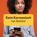 Frau schaut frustriert auf ihr Handy, weil sie kein Koreanisch auf Babbel finden kann, aber wir haben zwei wunderbare Alternativen gefunden