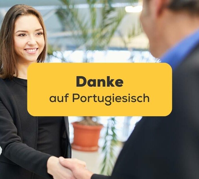 Frau schüttelt Hand mit Geschäftspartner um Danke auf Portugiesisch auszudrücken, wie sie es mit der Ling-App gelernt hat